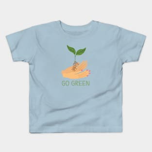 Hands holding green sprout. Kids T-Shirt